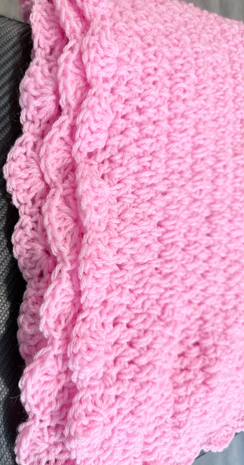 Close up of Ballet Pink Baby Crochet Blanket scalloped trim detail
